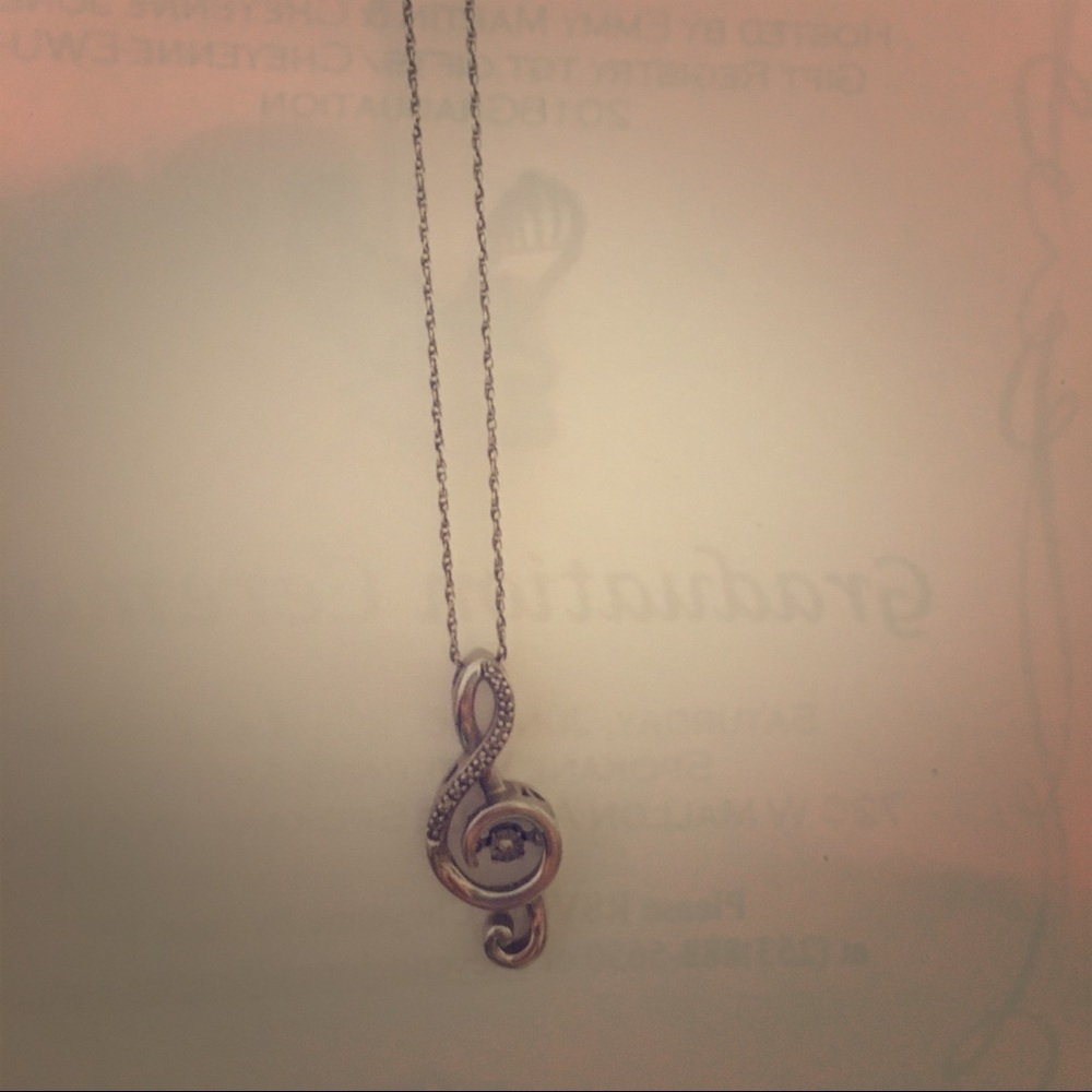 Treble clef diamond in rhythm necklace